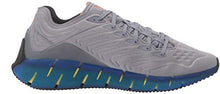 Load image into Gallery viewer, Reebok unisex-adult Zig Kinetica, cold grey/vector blue/utility yellow, 13 M US
