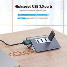 Load image into Gallery viewer, ORICO 4 Port USB 3.0 Unibody Aluminum Portable Data Hub with 3.3ft Extension Cable for MacBook Pro/Mini, iMac, XPS, Surface Pro, Notebook PC, USB Flash Drives, Mobile HDD - Space Gray
