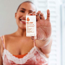 Load image into Gallery viewer, Bio-Oil Skincare Oil, 2 Ounce, Body Oil for Scars and Stretchmarks, Hydrates Skin, Non-Greasy, Dermatologist Recommended, Non-Comedogenic, For All Skin Types, with Vitamin A, E
