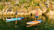 Load image into Gallery viewer, ISLE Pioneer Inflatable Stand Up Paddleboard &amp; iSUP Bundle Accessories &amp; Backpack — Wide Stance, Durable, Lightweight — 285 lbs Capacity (Coral Pink, 10'6" x 34" x 6")
