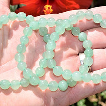 Load image into Gallery viewer, CHARGED Green Aventurine Crystal Bracelet 8mm Round Tumble Polished Stretchy + Selenite Baby Heart Charging Crystal (GAIN CREATIVITY, COURAGE, INDEPENDENCE, PROSPERITY - BALANCES EMOTIONS)
