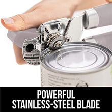 Load image into Gallery viewer, Gorilla Grip Manual Handheld Strong Can Opener, Sharp Cutting Wheel for Smooth Edge Cut, Oversized Easy to Use Turn Knob, Comfortable Soft Handle, Includes Built in Bottle Opener, Almond
