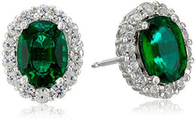 Load image into Gallery viewer, Amazon Collection Rhodium Plated Sterling Silver Created Emerald 8x6mm and Created White Sapphire Oval Halo Earrings
