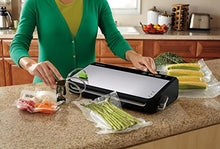 Load image into Gallery viewer, FoodSaver FM2435 Vacuum Sealer Machine with Bonus Handheld Sealer and Starter Kit | Safety Certified | Silver
