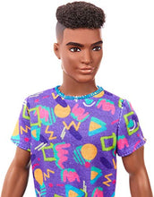 Load image into Gallery viewer, Barbie Ken Fashionistas Doll #162 with Rooted Brunette Hair Wearing Graphic Purple Top, Shorts &amp; Yellow Shoes, Toy for Kids 3 to 8 Years Old
