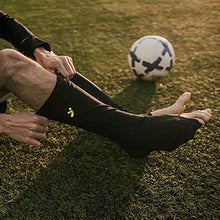 Load image into Gallery viewer, Storelli BodyShield Leg Guards | Protective Soccer Shin Guard Holders | Enhanced Lower Leg and Ankle Protection | Black | Youth Medium
