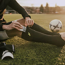 Load image into Gallery viewer, Storelli BodyShield Leg Guards | Protective Soccer Shin Guard Holders | Enhanced Lower Leg and Ankle Protection | Black | Youth Medium
