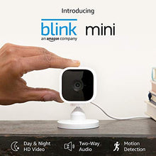 Load image into Gallery viewer, Introducing Blink Mini – Compact indoor plug-in smart security camera, 1080 HD video, motion detection, Works with Alexa – 1 camera
