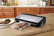 Load image into Gallery viewer, FoodSaver FM2435 Vacuum Sealer Machine with Bonus Handheld Sealer and Starter Kit | Safety Certified | Silver

