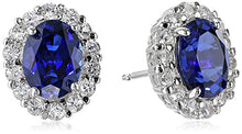 Load image into Gallery viewer, Sterling Silver Blue and White Created Sapphire Oval Earrings
