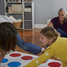 Load image into Gallery viewer, Twister Game, Party Game, Classic Board Game for 2 or More Players, Indoor and Outdoor Game for Kids 6 and Up, Packaging may vary
