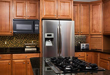 Load image into Gallery viewer, Impecca OM-1600K 1.6 cu. ft. Over-the-Range 30” Microwave Oven 1000 Watts, with Surface Light, 2 Speed Vent System, Touch-pad Controls, Digital Clock, Timer, LED Display and Child Lock, Black
