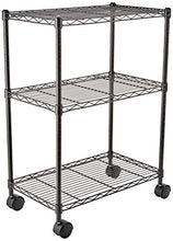 Load image into Gallery viewer, Amazon Basics 4-Shelf Adjustable, Heavy Duty Storage Shelving Unit on 4'' Wheel Casters, Metal Organizer Wire Rack, Black (36L x 14W x 57.75H)
