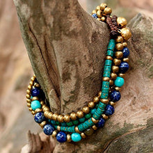 Load image into Gallery viewer, NOVICA Lapis Lazuli Brass Beaded Torsade Bracelet 'Freedom of Expression in Blue'
