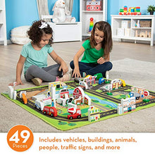 Load image into Gallery viewer, Melissa &amp; Doug Deluxe Activity Road Rug Play Set with 49 Wooden Vehicles and Play Pieces
