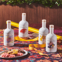Load image into Gallery viewer, Brightland The Artist Capsule Cold-Pressed Olive Oils - Oprah’s Favorite Olive Oil Set Infused with Garlic, Lemon, Basil, and Chili Peppers, 12.7 fl. oz. Bottles (Pack of 4)
